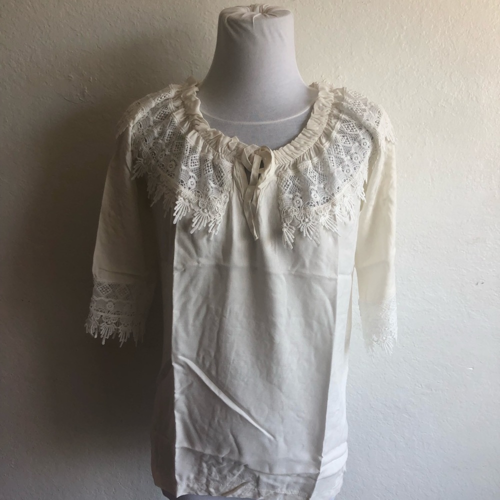 Pleated lace blouse